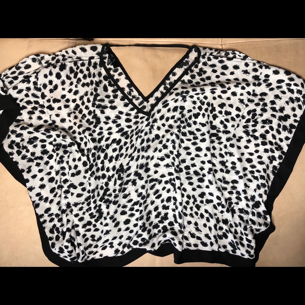 Macy’s black and white cheetah print blouse